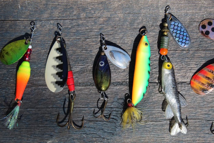 5 fishing lures on table